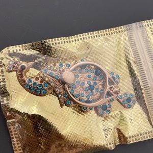 - Rhinestone peacock phone ring